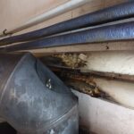 Rauchrohr im Heizraum zu nah an der leitungen. Verkleidung schon abgebrannt